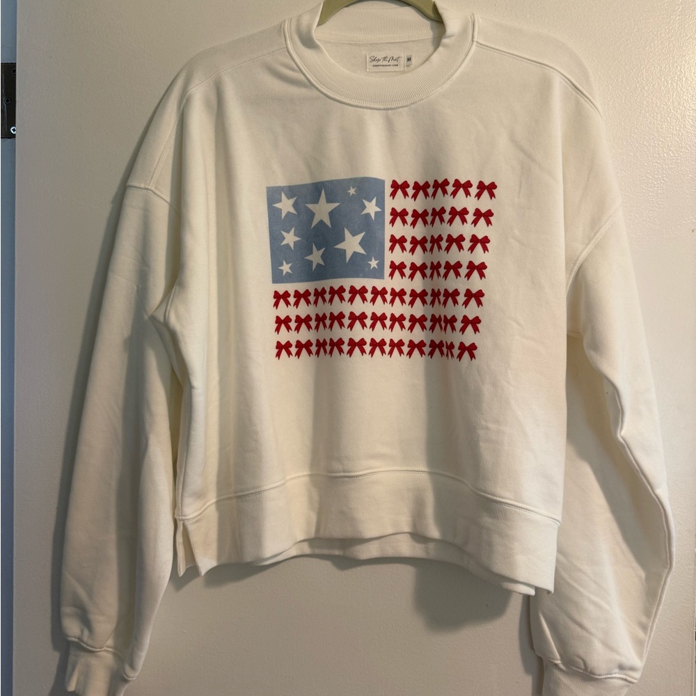 White Sweatshirt with Flag Design